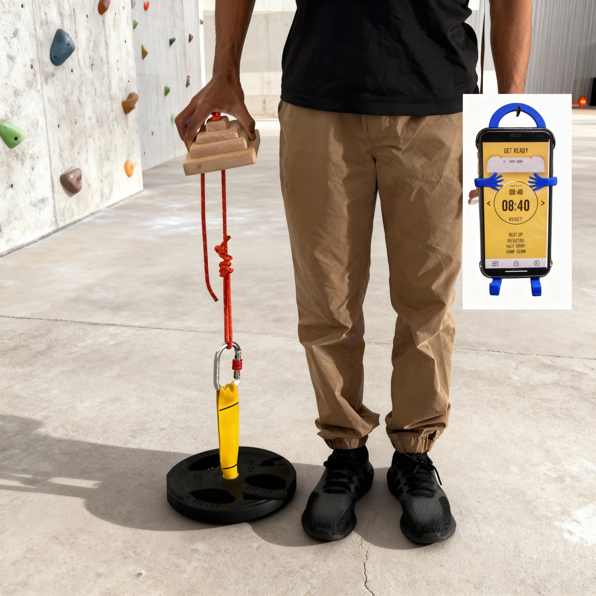 A person holding a pinch block to improve pinch strength