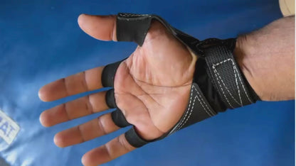 a person rock climbing using crack climbing gloves